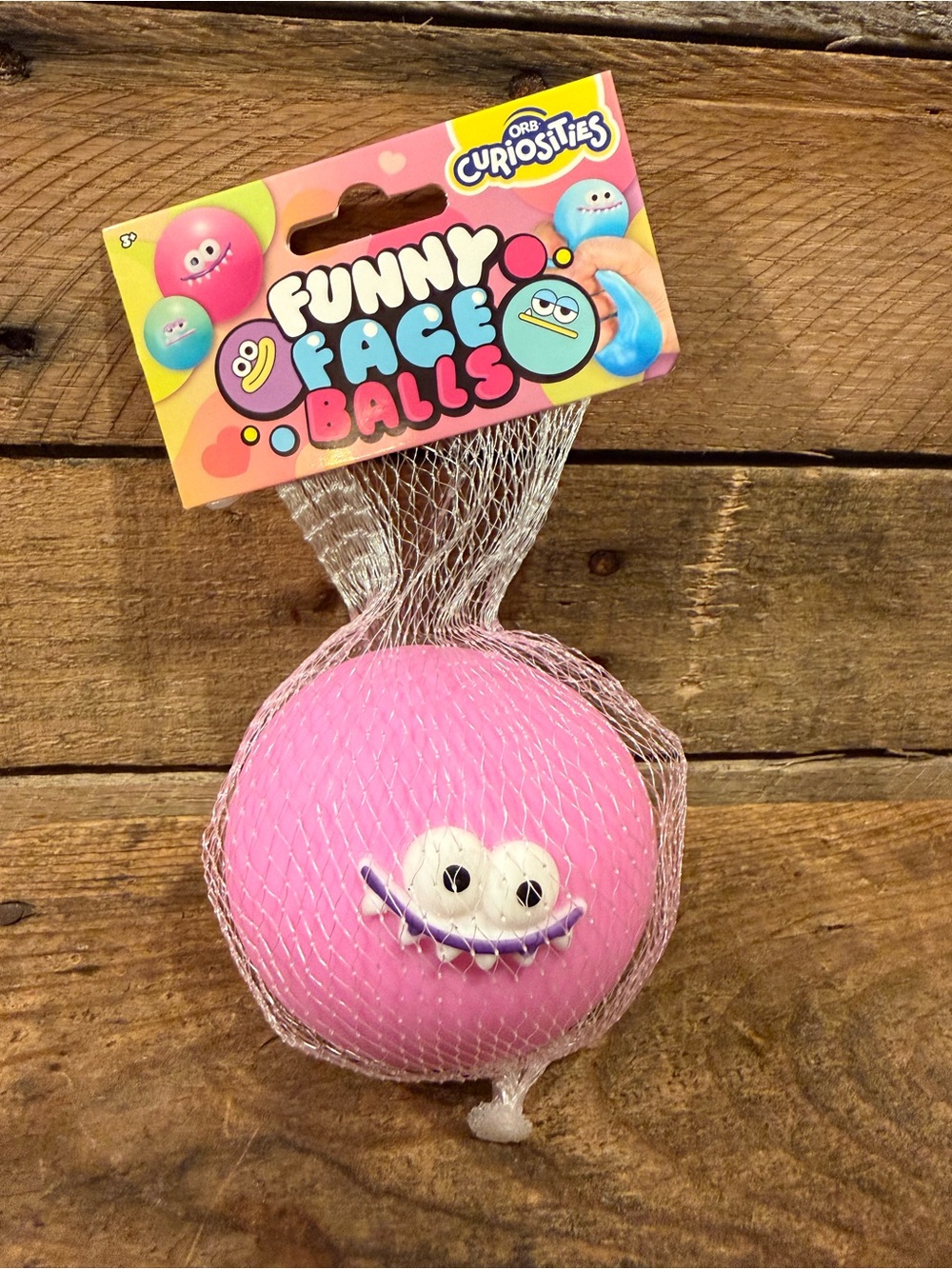 Funny Face Balls Pink Squeezable Plush Toy by